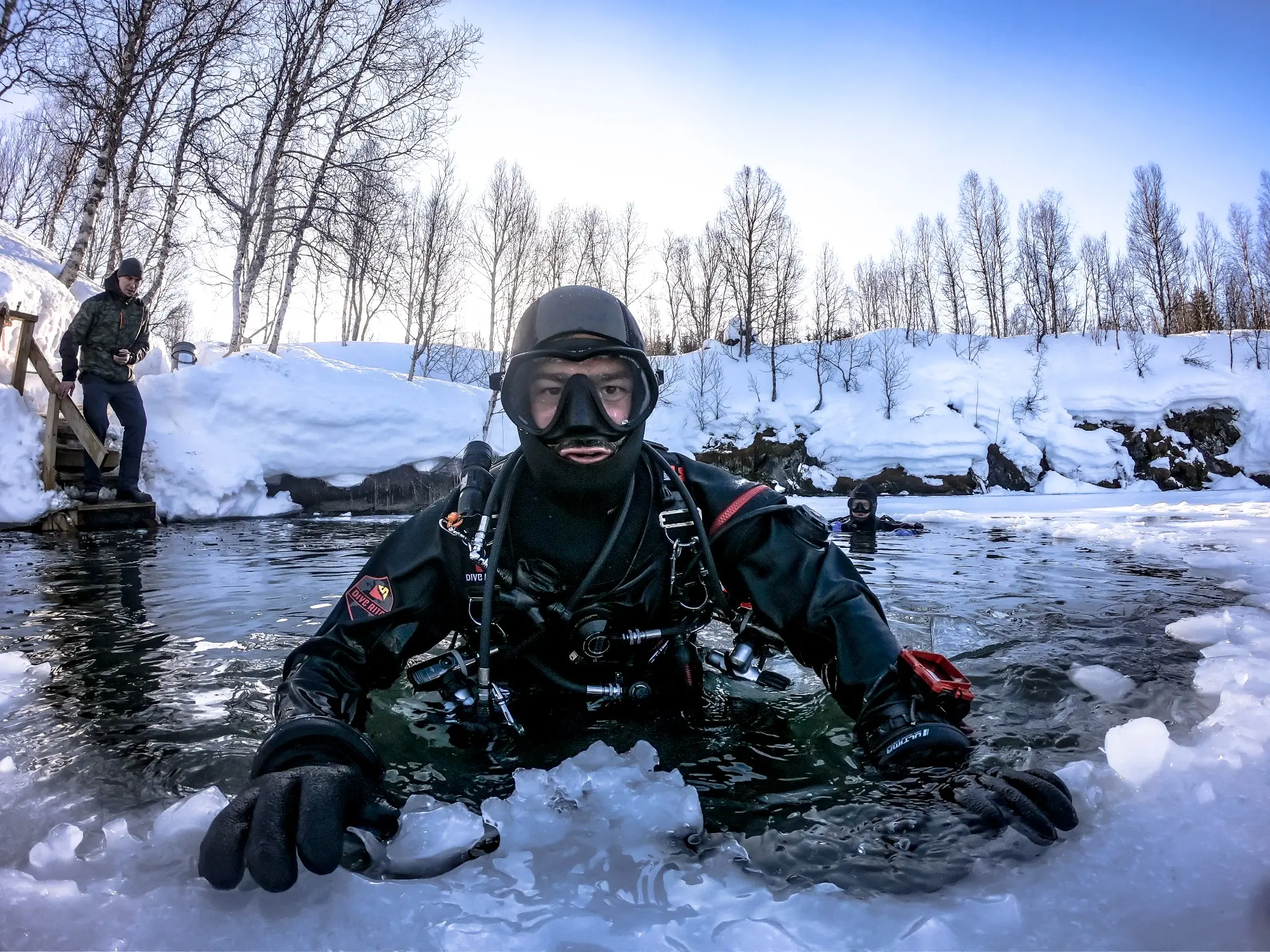Technical diver entering the icy water at Plura, Norway